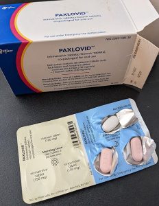 Paxlovid box and pills in open packet - will it work for Long Covid? Image by Kches16414 via Wikimedia Commons