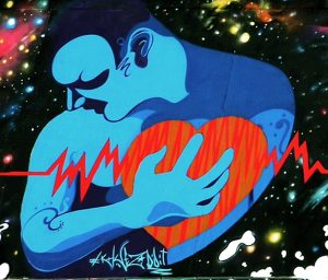Graffiti art, blue man with heart problem