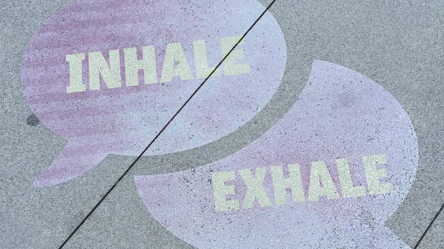 Street art says inhale and exhale. Breathing exercises for long covid